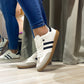 zapatillas samba style blanco negro diseño moderno y ligero con materiales de ecocuero y gamuza
